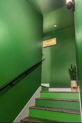 Custom neon/wood sign added to stairwell