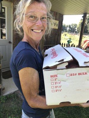 Farmer Lydia with peaches