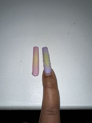 The pink and yellow (left hand) is the nail that came off less than 24hours and purple is my original (right hand)