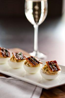 Deviled egg with caramelized bacon