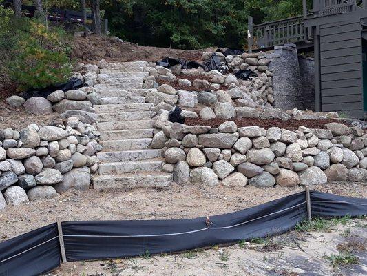 Steps, boulder walls, boulder landscape.