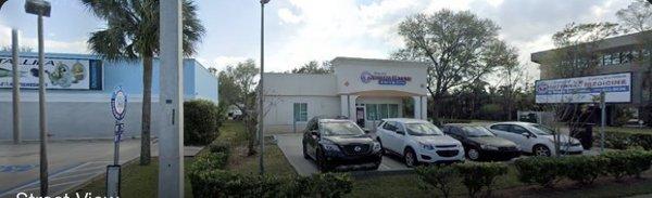 Front entrance of CARE Spine and Sports Health located at 2795 West New Haven Avenue, West Melbourne FL 32904.