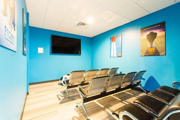 Mini movie theater at Dallas dentist Fresca Dental