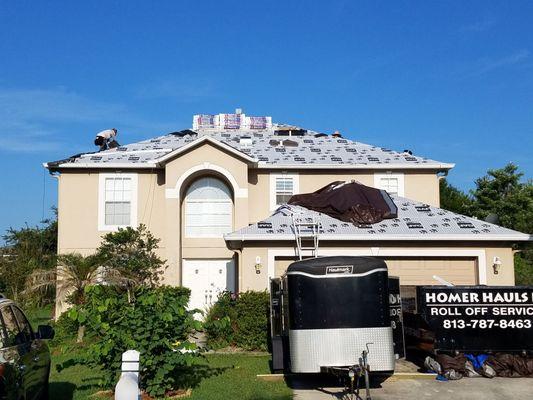 The Bodan Roofing Team in the process of putting on a new roof. They were very professional. Excellent job!