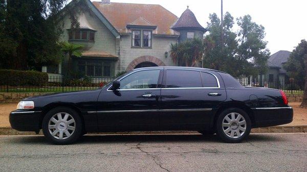 Our Redlands based Town Car in front of an historic home in Redlands, CA.
 
 Photo: Larry R. Erickson