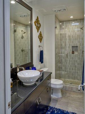 Bathrooms at The Roscomare have been Upgraded to Include Stone Counters, Modern Fixtures and Custom Cabinetry