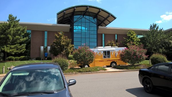 Mr. Cone truck in front of our building serving tasty treats!