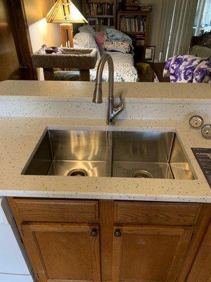 After with new sink/ sensor faucet and recycled glass quartz!