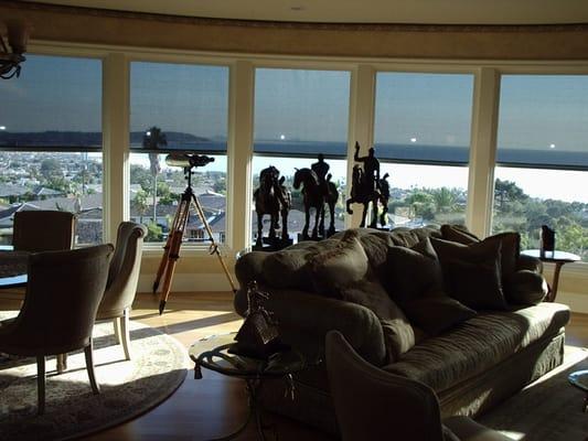 Motorized Sunscreen Roller Shades.  Retain your view with maximum protection!