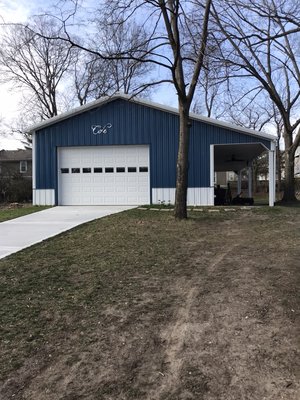 Garage with a porch