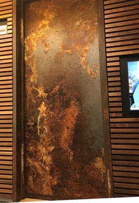 Luminore rust finish on a sound door and frame.