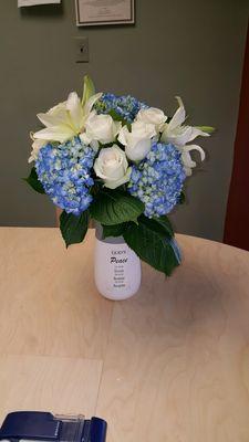 An arrangement Jasmen did for a law enforcement widow's 1 year EOW date. Custom vase too!