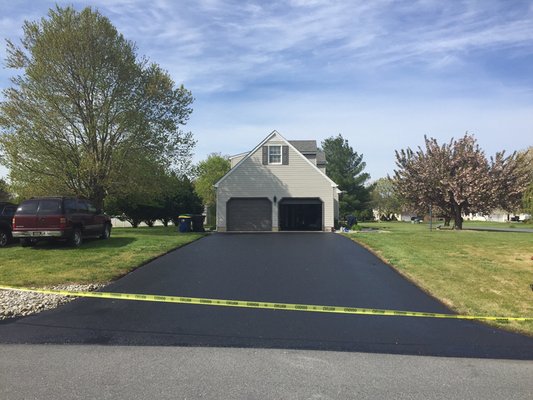 Asphalt driveway freshly seal coated