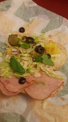 I just ordered this. Black forest ham+turkey..There's 2 slices. All veges, no tomatoes, extra banana peppers+onions.. it looks like scraps..