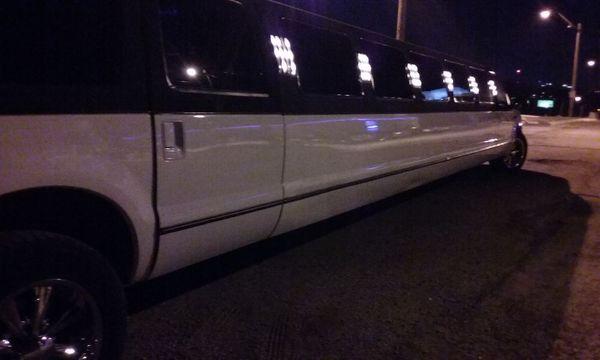 Bachelorette party Limo awaiting girls having fun.