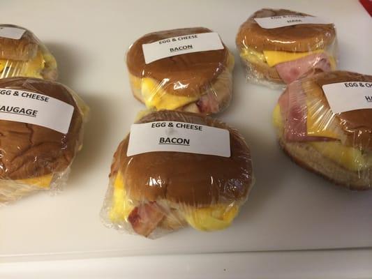 Delivered fresh every morning at 6:15.  Egg, Cheese with either Ham, Sausage or Bacon.  They are delicious! $2.29