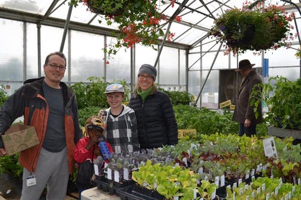 A family shopping for their home garden.