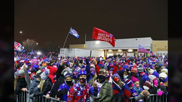 Thousands of fans welcome their team home at the airport.  First AFC East championship in 25 years for the Bills.  Photo credit Bills