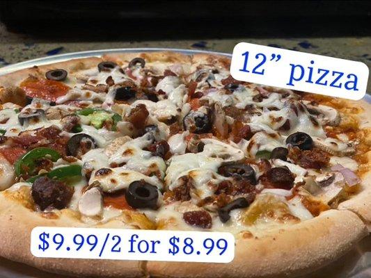 Authentic Stoned Cooked -12" Medium sized Italian Pizza up to 3 toppings for $9.99 or buy 2 for $8.99 . Ea h additional topping is .50