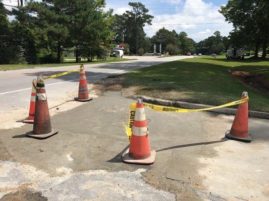 Finally patching the giant hole in the parking lot.