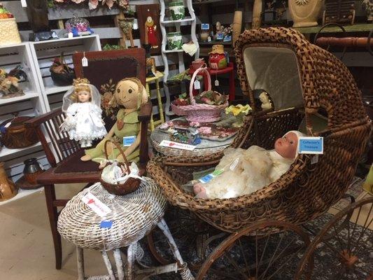 Vintage wicker carriage and dolls to die for