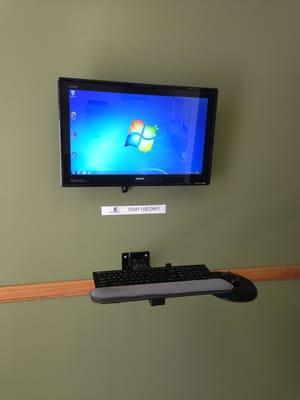 Touch screen computer where you sign your health history form.