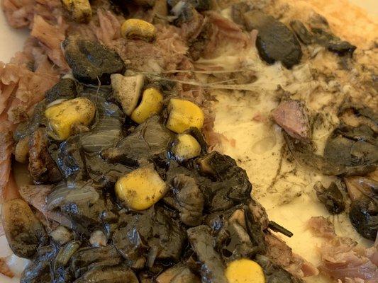 inside GORDO's QUESADILLA (corn tortilla, mozzarella, huitlacoche, and lamb)