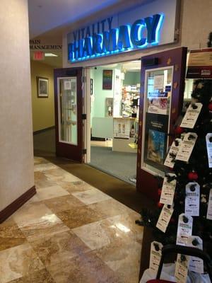 Entrance to pharmacy is to the right of entrance to urgent care.