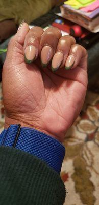 Almond shaped gel nails w nude base, green tips