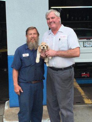 Auggie, the cute puppy Union Weber has in their waiting room! Mark (the owner, on the right) even lets you walk him if you want!