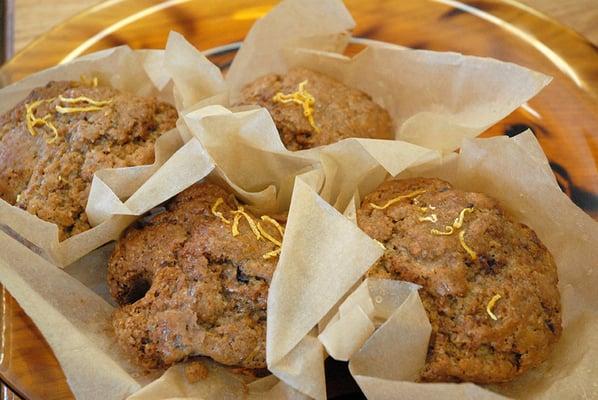 Yummy berry muffins are moist and flavorful and so large they have to serve them in handmade wrappers.