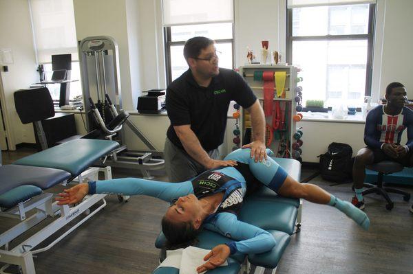 Here is Dr. Schuman providing a Side-lying stretch for a patient with lower back pain