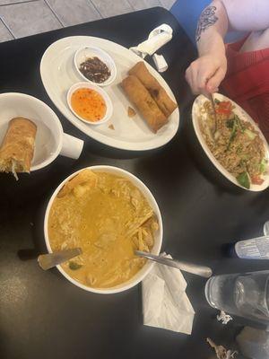 Egg rolls, thai fried rice with chicken, combination red curry with beef