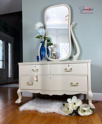 Painted Clawfoot dresser with original mirror.  This dresser had three broken legs which were repaired.