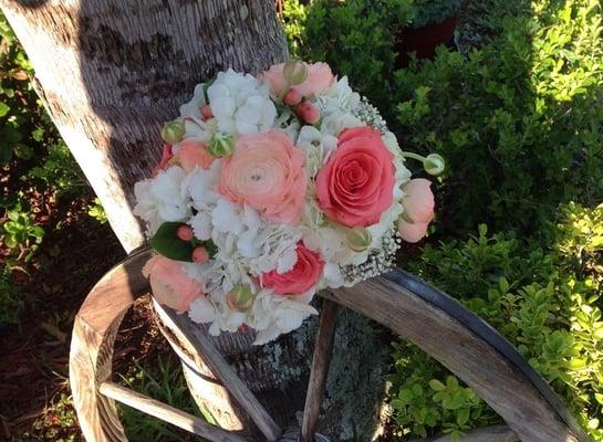 Bridal bouquet ,  white  hydrangeas and pink ranunculus