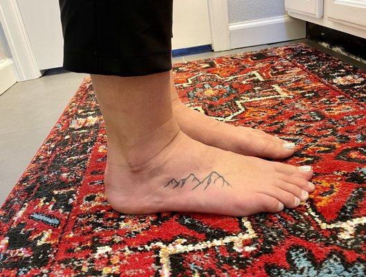 Right Foot Tattoo of Mountain Range