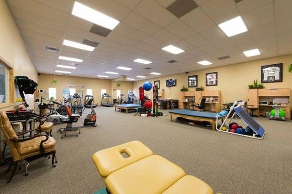 Our gym floor, fully stocked with all of the most up-to-date therapy equipment.