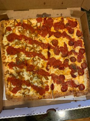 Grandma pizza half pepperoni half breaded chicken! Delicious