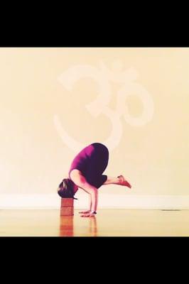 Working on my crow pose at West Asheville Yoga