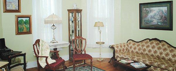 The parlor makes a great room for relaxing and reading.