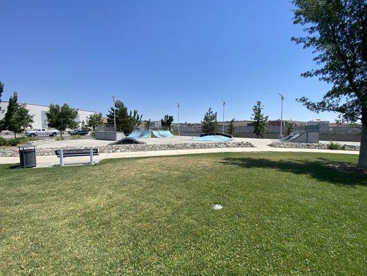 View of the skate park from the grass.