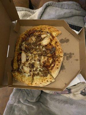 Bar b que pizza that was dropped