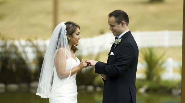 Bride and groom exchange rings.