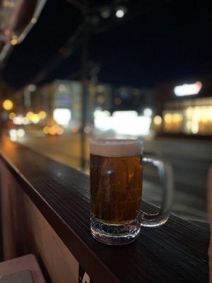 Draft beer and street view. I like an outside dining option!