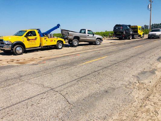 The wrecker is using an old school method of "slinging". When the wheel lift can't get the job done our skillful drivers find a way.