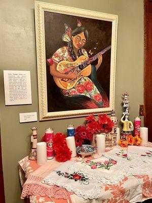 A painting by Michoacán artist Jaime Vanegas Castro and embroidery by Carolina Sanchez.