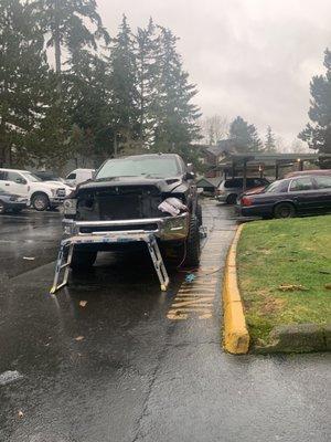 Using the fire lane to do work on their truck that didn't move for a over a month.