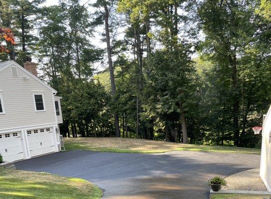 Driveway after applying sealcoat.