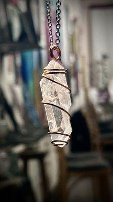 Hand wrapped quartz pendant by Heather Pilapil. Learn more here: https://www.heatherpilapil.com/product-page/crystal-pendant-tumbled-quartz