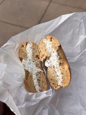 Sundried tomato bagel with garlic and herbs cream cheese